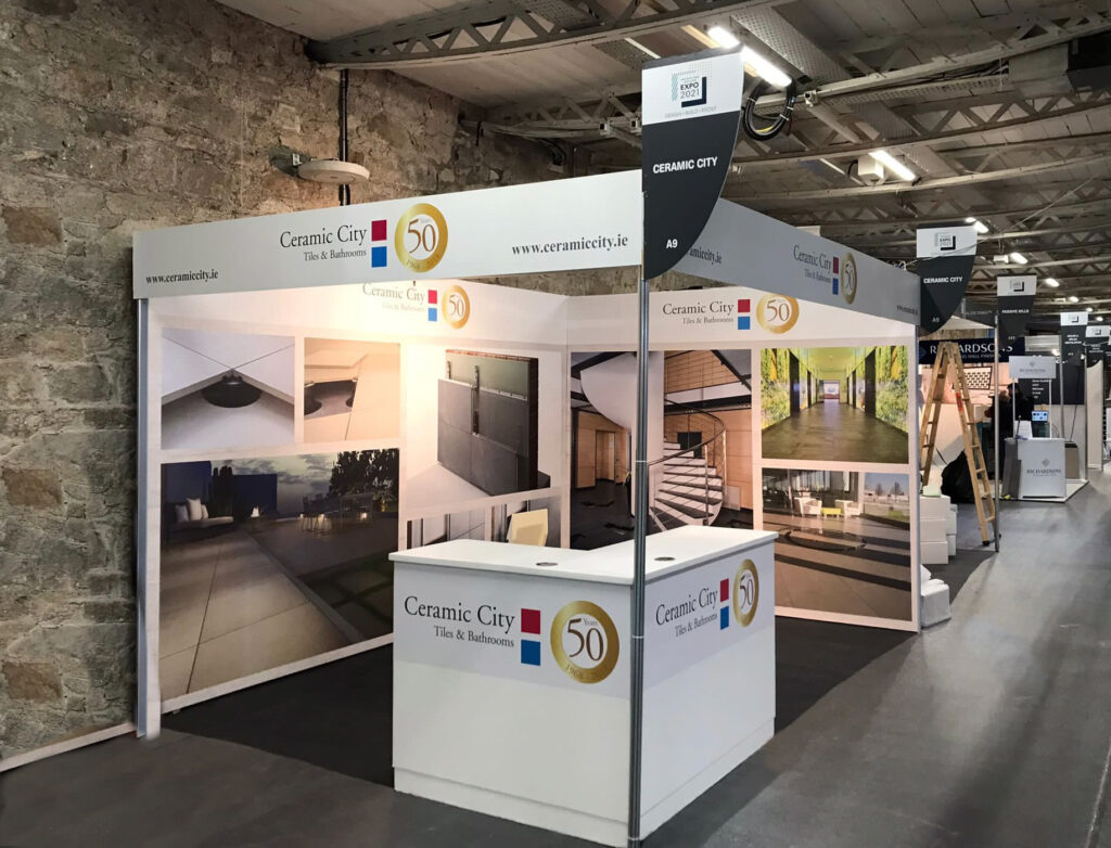 A modern indoor exhibition stand featuring a captivating display of ceramic tiles, showcasing stunning designs and inspiring ideas for your next project.