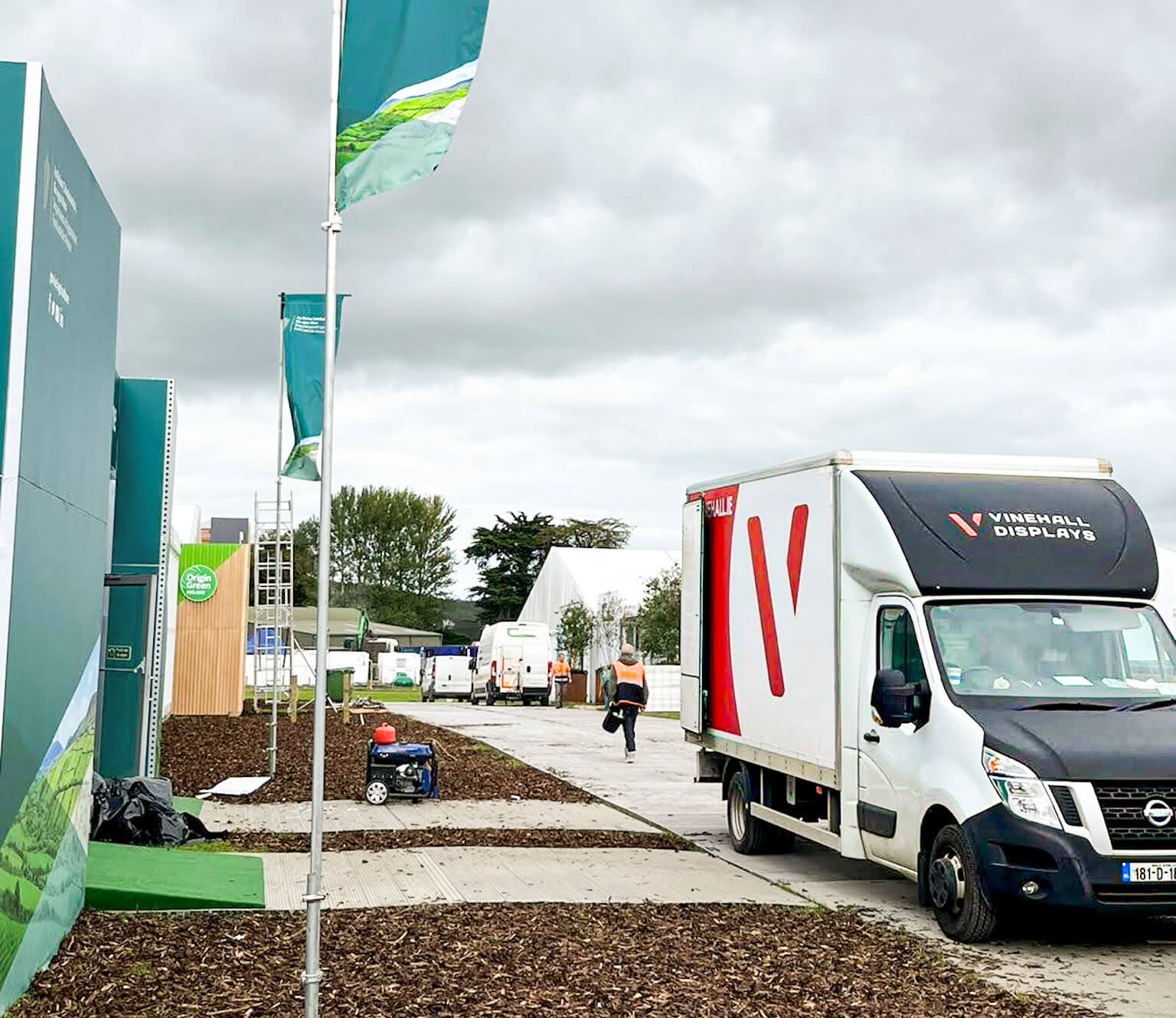 A van outside of an exhibition stand at the national ploughing championships in ireland.