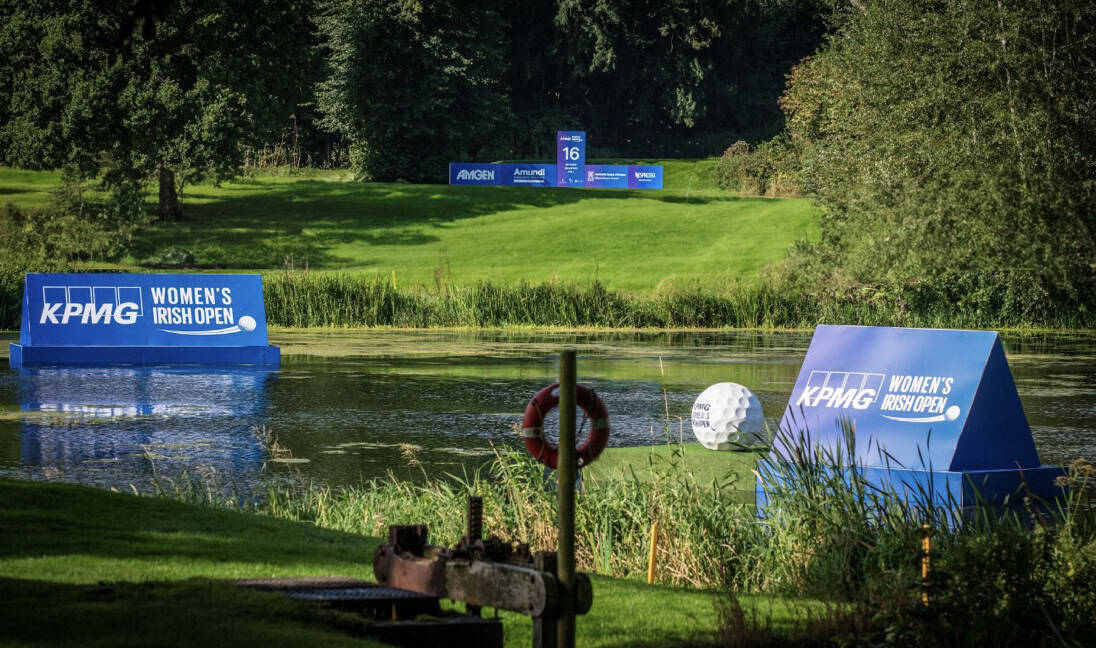 floating signage in a pond on a golf course to