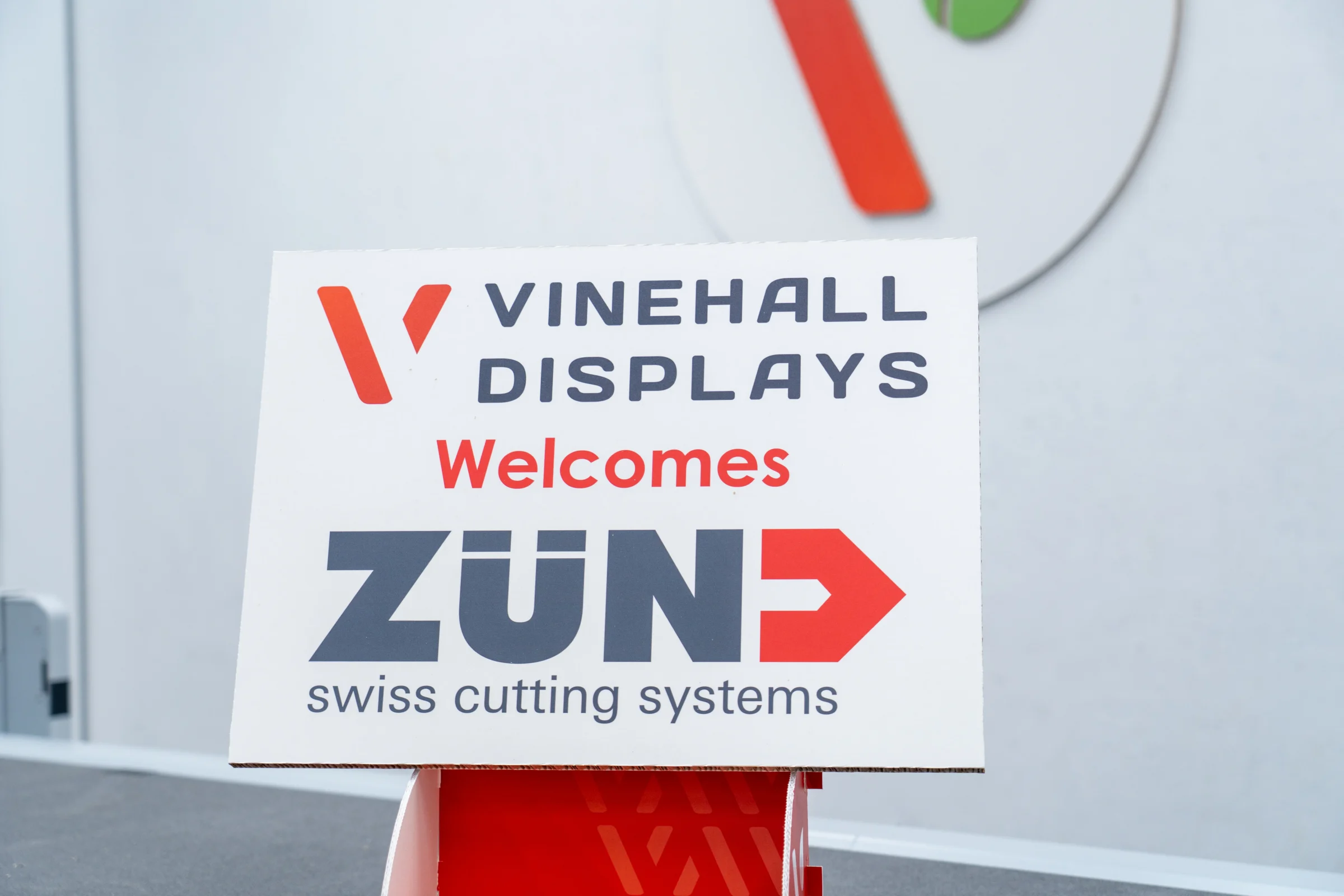 a printed sign reading Vinehall Displays Welcomes Zund